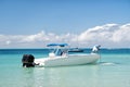 Man, yachtsman on motorboat on water, in St. John, Antigua Royalty Free Stock Photo