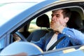 Tired man sleeps in car Royalty Free Stock Photo