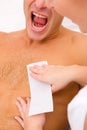 Man yelling while waxing Royalty Free Stock Photo