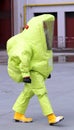 Man with yellow protective suit against biological risk