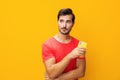 Man yellow mobile smartphone portrait space communication technology copy smiling phone cyberspace happy phone studio Royalty Free Stock Photo