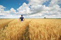 Man in yellow wheat meadow