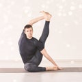 Man in yoga asana. Home studio. One person