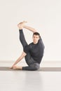 Man in yoga asana. Home studio. One person