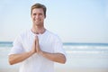 Man, yoga and beach with smile in portrait for peace, zen and space for mockup on vacation with meditation. Person Royalty Free Stock Photo