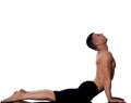 Man yoga cobra pose sun salutation surya namaskar Royalty Free Stock Photo