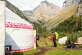 Man in a yurt camp in the mountains.