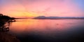 Mana Pools scene. Panoramic view of red sunset on african Zambezi river. The dramatic, red sky reflects on the surface of border Royalty Free Stock Photo