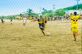 Manabi, Ecuador, May, 29, 2018: Group of friends having fun on the beach playing soccer. happy people and beach games Royalty Free Stock Photo