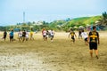 Manabi, Ecuador, May, 29, 2018: Group of friends having fun on the beach playing soccer. happy people and beach games Royalty Free Stock Photo