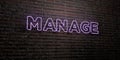 MANAGE -Realistic Neon Sign on Brick Wall background - 3D rendered royalty free stock image