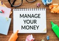 Manage Your Money is shown on a business photo using the text Royalty Free Stock Photo