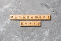 Management board word written on wood block. Management board text on cement table for your desing, concept Royalty Free Stock Photo