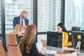 Manager boss starting a meeting with female officer in office space