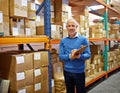 Manager, clipboard and portrait in warehouse with inventory for quality control or freight distribution. Senior Royalty Free Stock Photo
