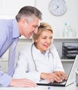 Manager and doctor reading news Royalty Free Stock Photo