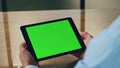 Manager hands using chromakey tablet office closeup. Unknown man looking device