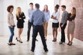 Manager Having Conversation With His Business Colleagues Royalty Free Stock Photo