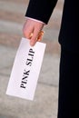 Manager holding a job termination notice Pink Slip Royalty Free Stock Photo