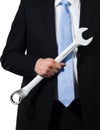 Manager holding wrench