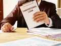 Manager holds Conventional loan agreement. Royalty Free Stock Photo