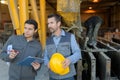 Manager and industrial worker outside factory Royalty Free Stock Photo