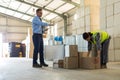 Manager instructing female worker while working Royalty Free Stock Photo