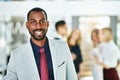 Manager, leader and boss standing with diverse team of executives in office background. Portrait of confident Royalty Free Stock Photo