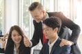 leader encourage team employee freshman during doing a good job project in office