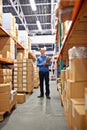 Manager, man and portrait in warehouse with clipboard for inventory, quality control and freight distribution. Senior Royalty Free Stock Photo