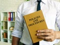 The manager offers Policies and procedures book.