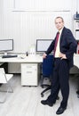 Manager in an office with blinds