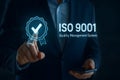 Manager presenting iso 9001 quality management system approval checkmark Royalty Free Stock Photo