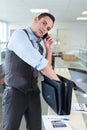 manager presents looking inside bag Royalty Free Stock Photo