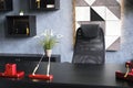 Manager's office setting. A black armchair next to a black desk. Royalty Free Stock Photo