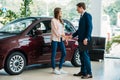 Manager shaking hands to customer after selling a car Royalty Free Stock Photo