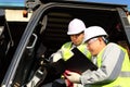 Manager talking to forklift operator Royalty Free Stock Photo