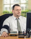 Manager telemonitoring blood pressure at workplace