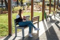 Managing Stress in High School. Stressed and tired student girl with laptop outdoors. Difficult exam, trouble, remote