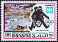 MANAMA DEPENDENCY - CIRCA 1971: A stamp printed in United Arab Emirates shows Two-seater luge, circa 1971.