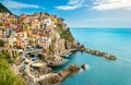 Manarola, Cinque Terre - romantic village with colorful houses on cliff over sea in Cinque Terre National Park Royalty Free Stock Photo