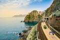 Manarola, Cinque Terre - train station in famous village with colorful houses on cliff over sea in Cinque Terre Royalty Free Stock Photo