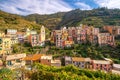 Manarola, Colorful cityscape on the mountains over Mediterranean sea in Cinque Terre Italy