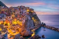 Manarola, Colorful cityscape on the mountains over Mediterranean sea in Cinque Terre Italy