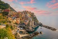 Manarola, Colorful cityscape on the mountains over Mediterranean sea in Cinque Terre Italy