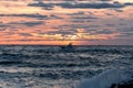 The fishing boat Fun Time heading out at sunrise