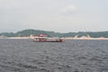 Manaus, Brazil - December 04, 2015: cargo ferry barge carrying cars