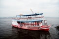 Manaus, Brazil - December 04, 2015: holiday cruiser ship on seascape. Pleasure boat float along sea coast. Summer vacation and tra Royalty Free Stock Photo