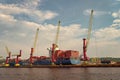 Manaus, Brazil - December 04, 2015: Maersk Bartolomeu dias cargo tanke in port with cranes Royalty Free Stock Photo