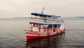 Manaus, Brazil - December 04, 2015: pleasure boat float along sea coast. Holiday cruiser ship on seascape. Summer Royalty Free Stock Photo